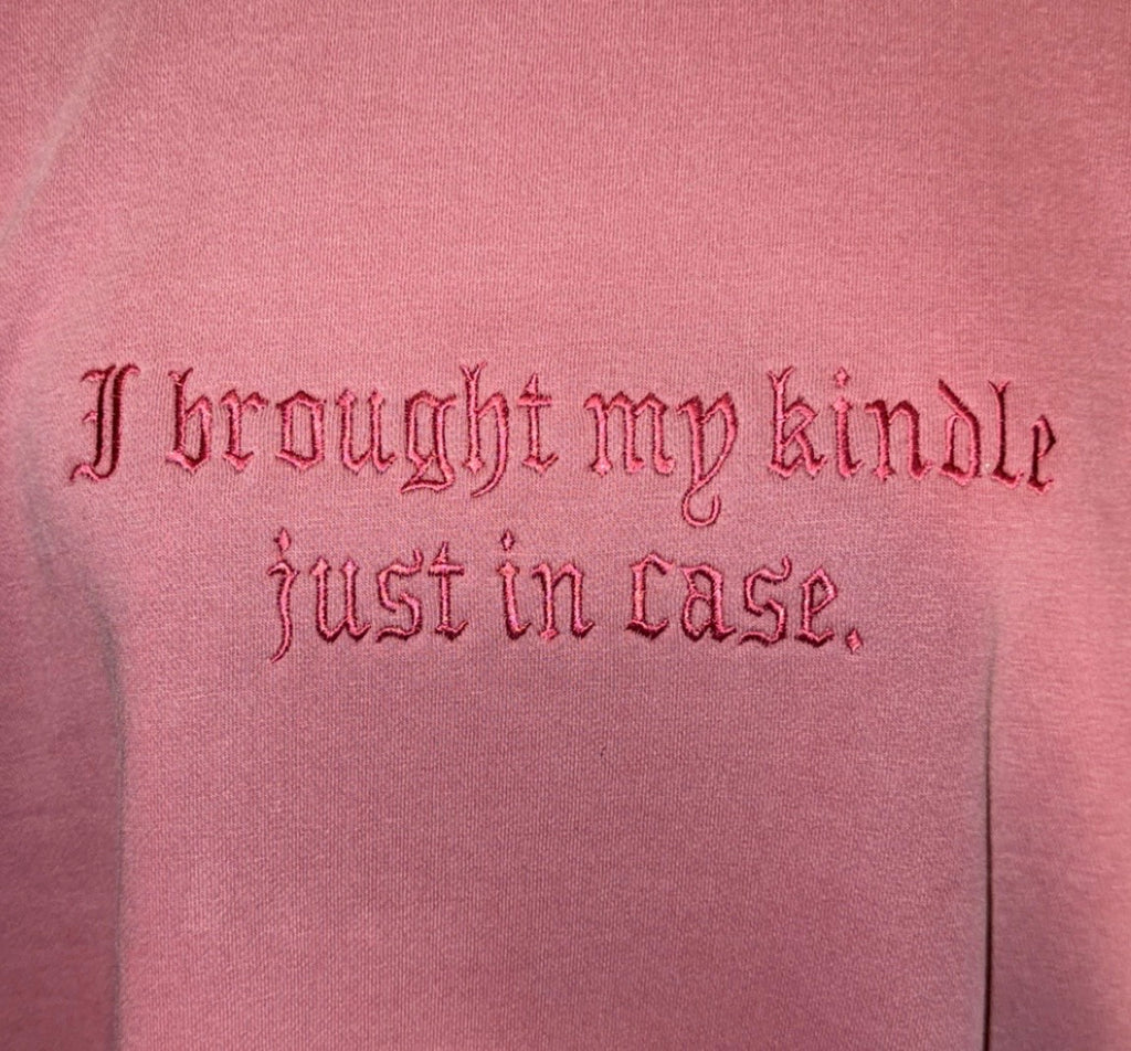 I brought my kindle just in case embroidered crew neck